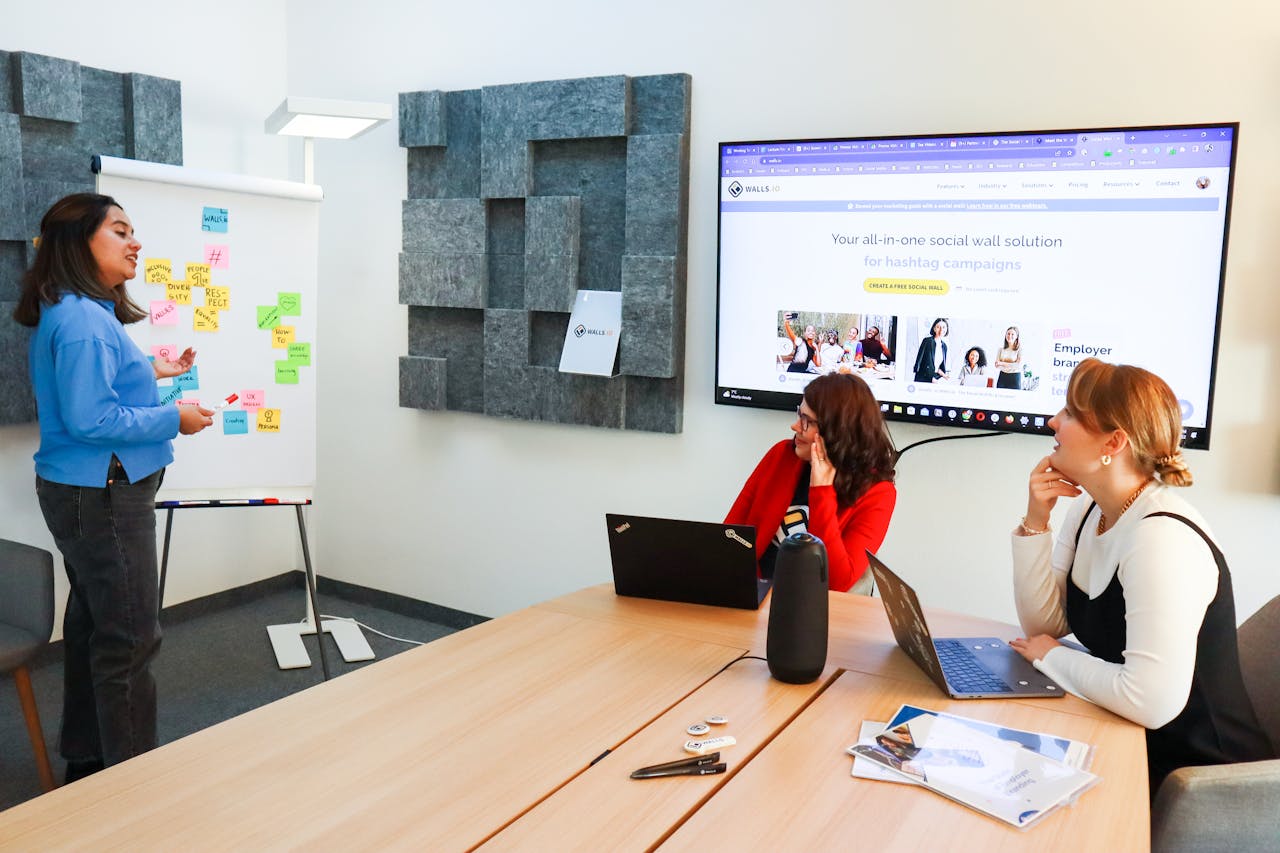 B2B sales team discussing deals and client accounts